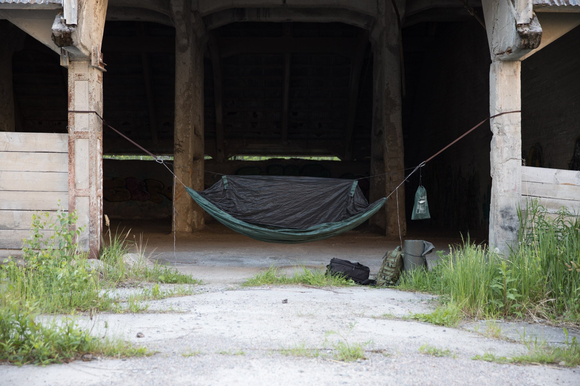 Frontline hammock in urban use. Whoopie Slings; Tree Huggers and Spectre carabiners are sold separately.