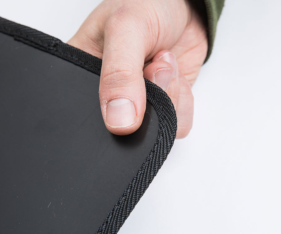 The webbing finished edges protect the backpack from the possibly sharp cut edges of the plastic sheet.