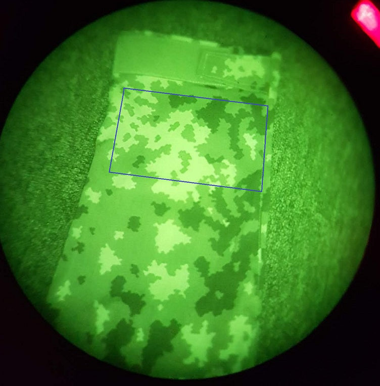 Särmä TST L4 Field Trousers leg; the highlighted area was treated with our fabric wax. Conclusion: the wax does not interfere with the NIR properties of the camouflage print. Photographed through a PVS-14.