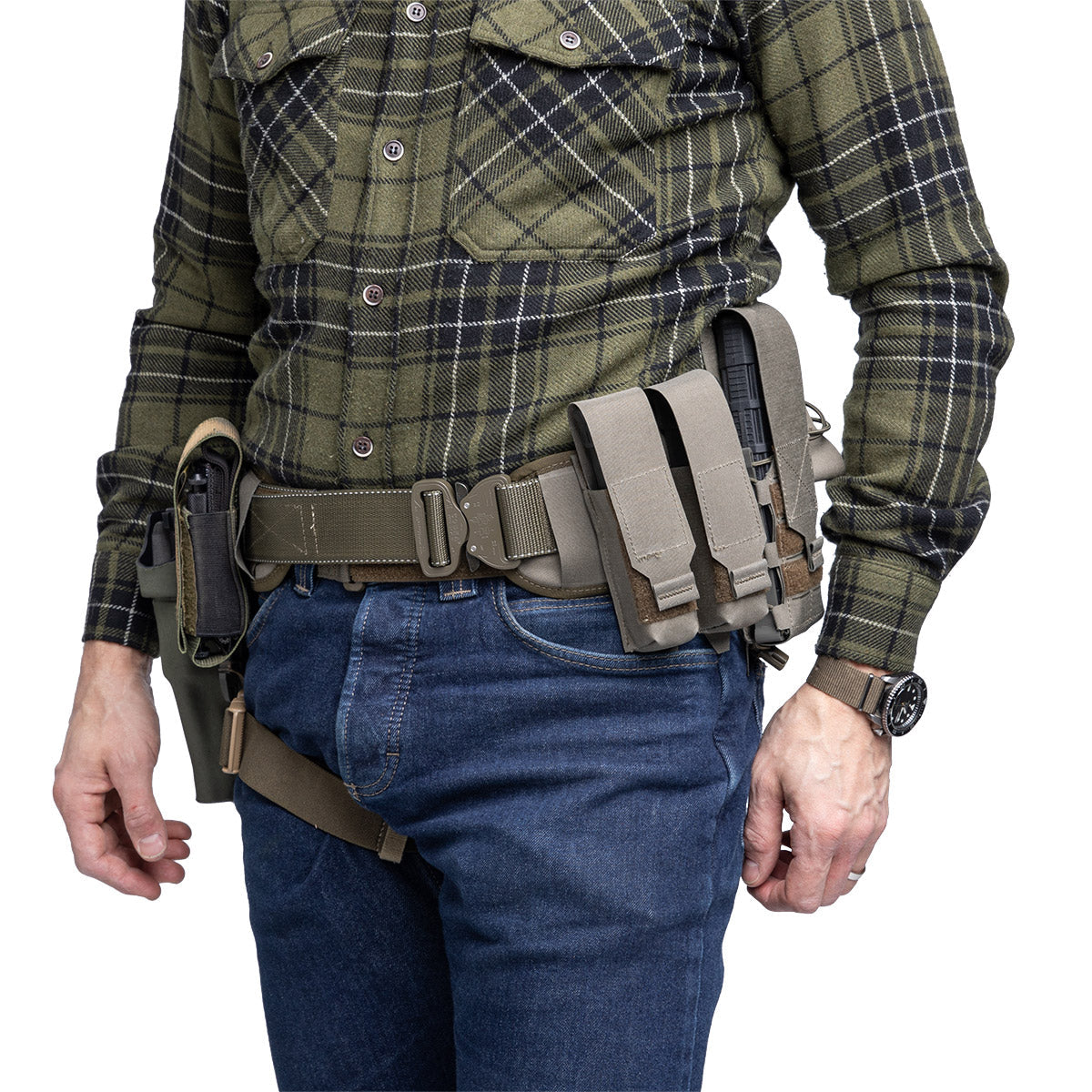 The webbing is double-laid and treated with resin to make it reasonably stiff without feeling like a steel band. It works really nicely as a duty belt and you can easily hang a sidearm from it too.