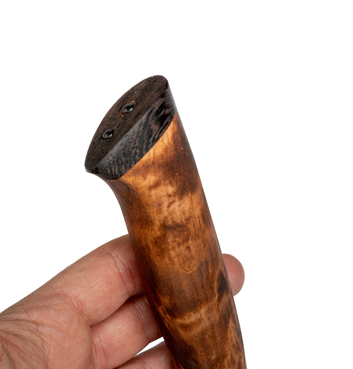 The handle is made from stained curly birch and wenge.