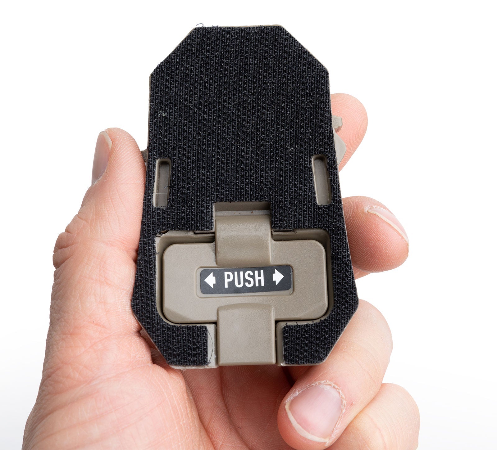 Battery compartment lid. To open; use any flat item from the rear end of the unit.