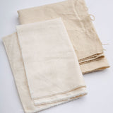 Washing textiles