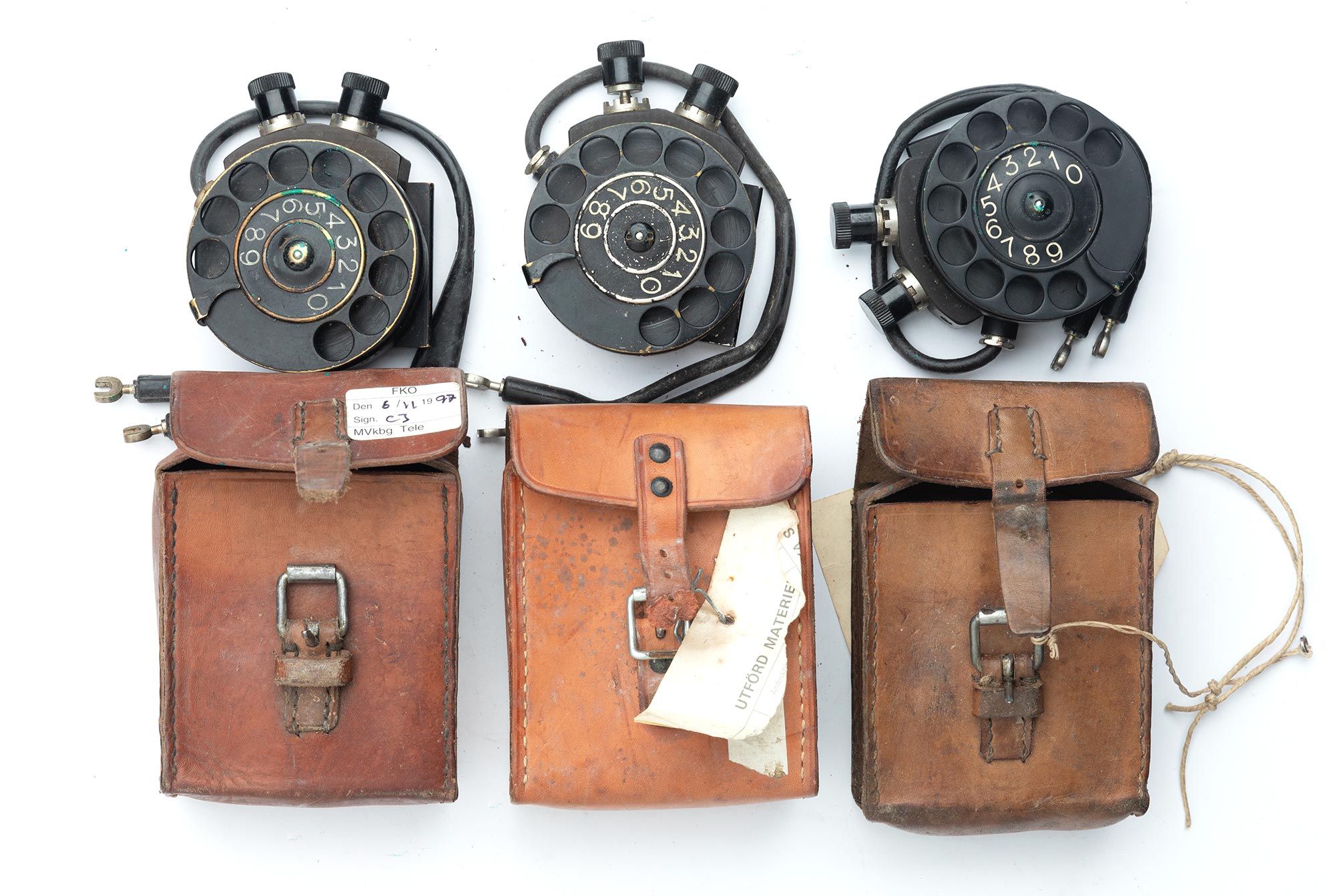 Swedish number scroll for field telephone, with leather case, surplus