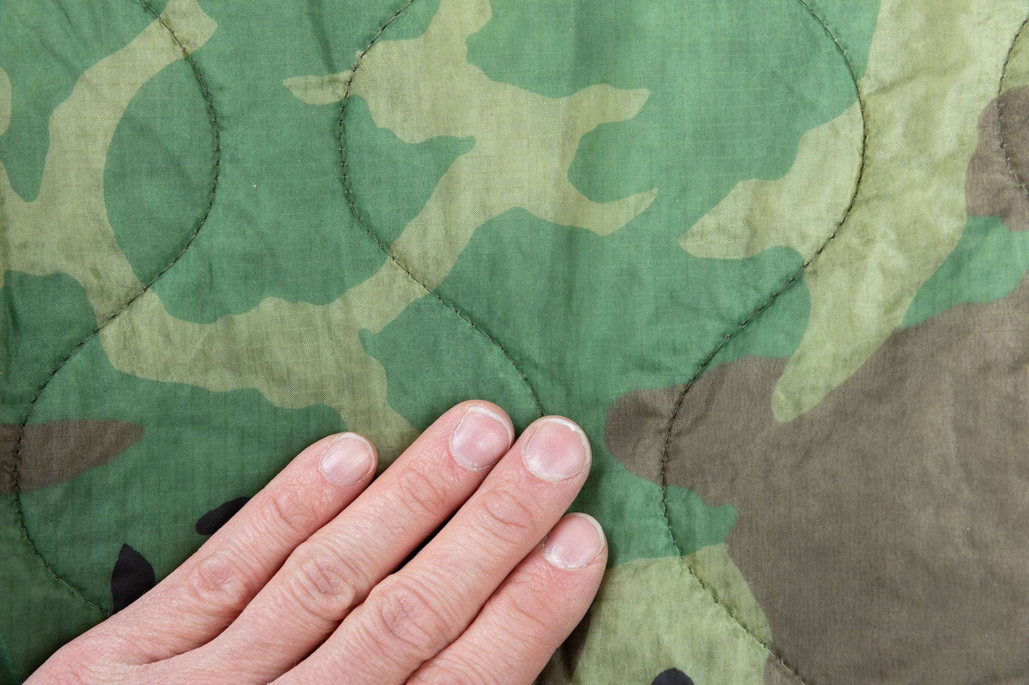 us_woobie_poncho_liner_woodland_surplus-065a92f15381f3.jpg