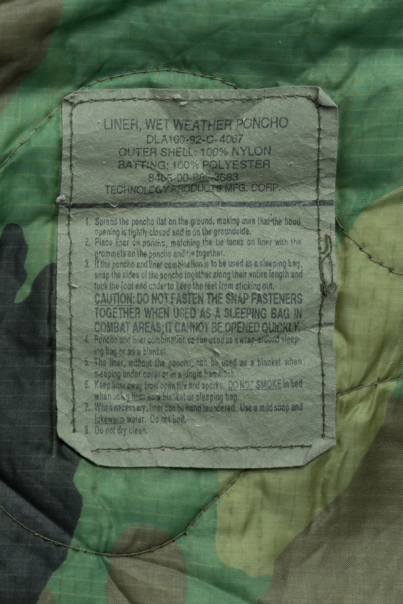 us_woobie_poncho_liner_woodland_surplus-065aa70d46d191.jpg
