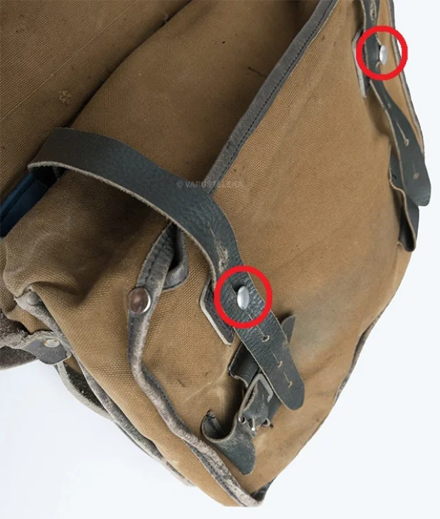 These knobs may not be present. It doesn't affect using the bag - unless you count the fact that having and using them slows you down.