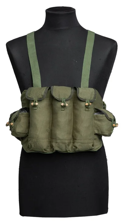 This chest rig has three AK 47 mag pouches and some smaller pockets for cleaning equipment, grenades, and such. 