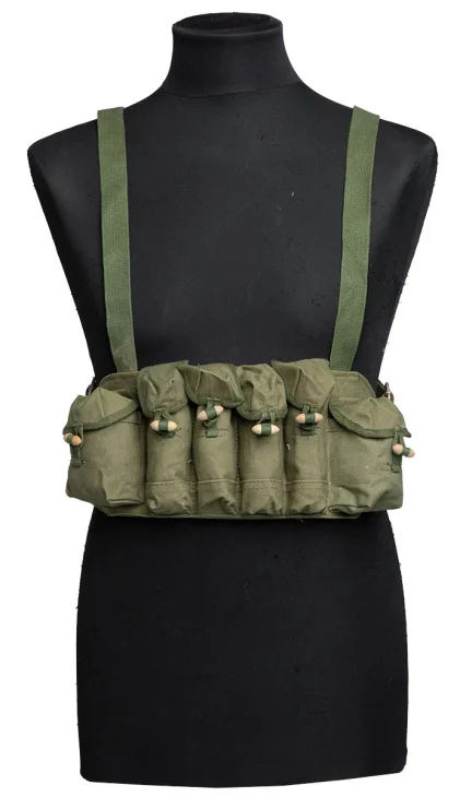 This chest rig has four submachine gun mag pouches and two wider but shorter pouches for a cleaning kit, grenades, etc.