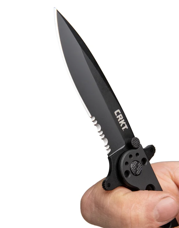 The black oxidized combination blade comes with a powerful deep-bellied spear point.