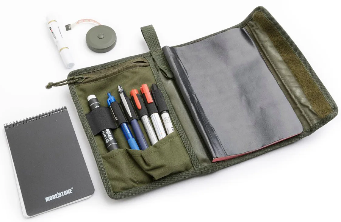 This user setup is for a marksman who journals shooting sessions to the larger notebook and carries a lens-cleaner, waterproof notebook, sharpies, pencils etc.