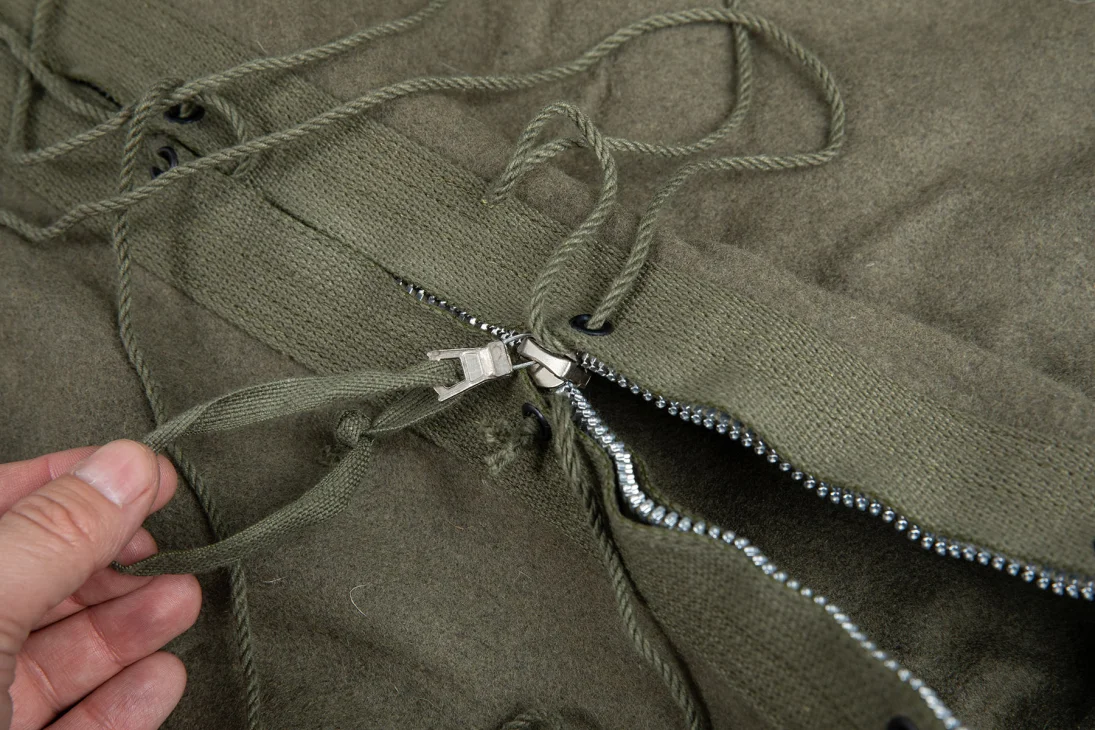 The zipper is very sturdy. It shouldn't break when you try to escape from the bag in horror.