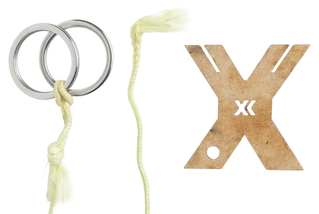 Two steel rings and a wooden X included.