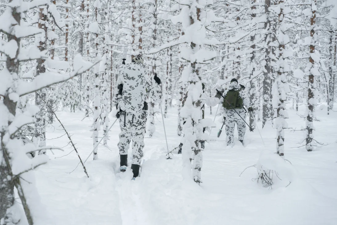 On the left L5 Thermal Patrol Coverall, on the right L7 camouflage anorak and pants