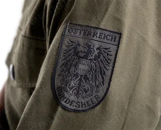 Some shirts have the Bundesheer insignia on the sleeve.