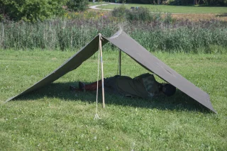 Two tent halves buttoned together. There's well enough room for two people inside.