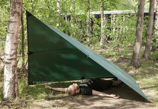 Pitched as a "loue" (Finnish term) the tarp nicely covers one happy camper.