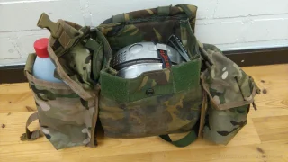 A camping kitchen carried in one package. Two extra MTP pouches were attached to the sides in the best DIY fashion.