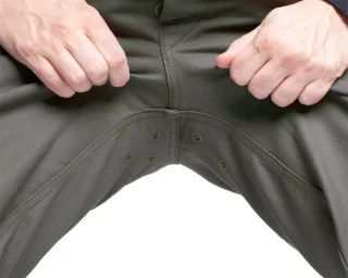 Ventilation grommets in the crotch.