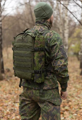 290 x 290 cm strapped onto the side of a combat pack.