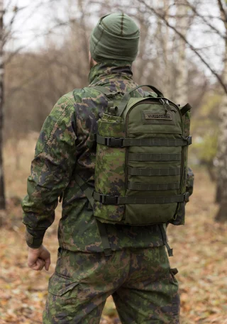 250 x 250 cm strapped onto the side of a combat pack.