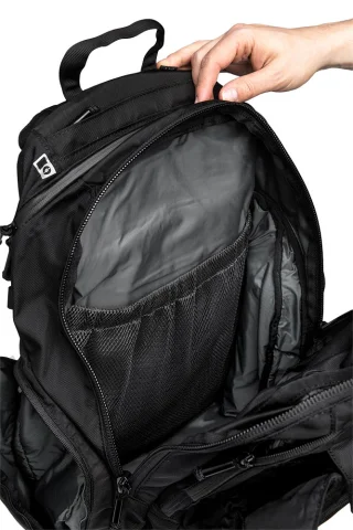 The main compartment with a mesh pocket on one side and a closed pocket on the other.