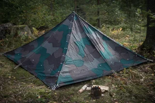 Pictured is a tent made of 4 shelter quarters.