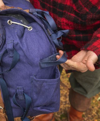 The bag is loaded with additional straps.