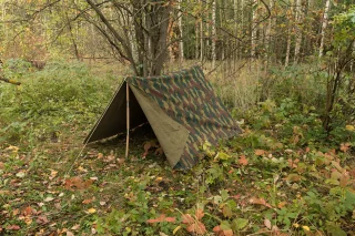 You will need two halves to pitch a proper tent. Poles, stakes, and guylines are sold separately.