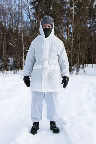 Pictured is a size 175 / 98 cm model wearing size 6080/9505 snow uniform with a load of warm stuff underneath.