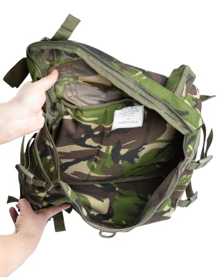 Daypack has only one compartment but carrying straps on the sides and at the top and the bottom.