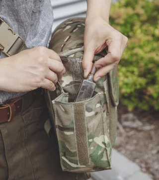 The bag in the pic is the British Osprey Gas Mask Pouch. 