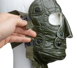 The adjustable straps are snapped on the mask.