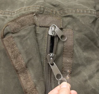 The zipper is usually 2-way but in some cases, one of the sliders may be broken.