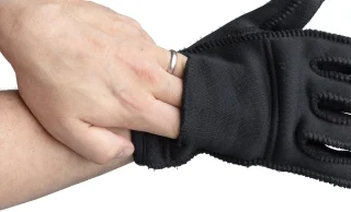 The liner glove has a pocket for a hand warmer.