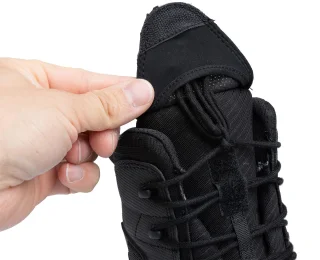 Compartment for laces.