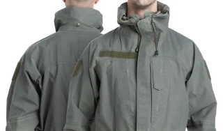 The hood can be secured to the collar with snap fasteners.