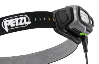 The headlamp has a rechargeable battery and the charging cable is included.