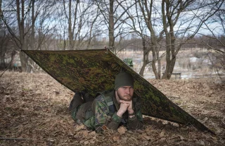 The poncho can be used to construct different types of emergency shelters.