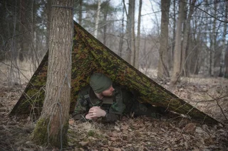 The poncho can be used to construct different types of emergency shelters.